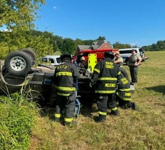 Rollover Off Bud Moore Lane Traps Driver, Crews Rush Tools by Staff Car