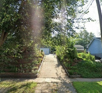 Saint Paul Man Pointed Gun at Woman, Hid It From Police, Charges Say