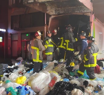 SF Firefighters Dig Through Trash to Free Man Trapped Inside Recology Truck