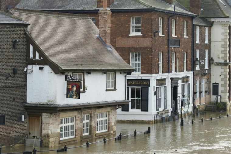 Softballs, Toys and Coconuts Clog The Acreage's Canals as Flood Fears Rise