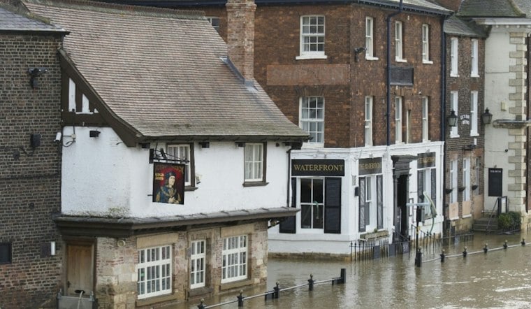 Softballs, Toys and Coconuts Clog The Acreage's Canals as Flood Fears Rise