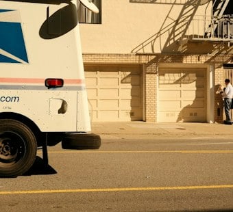 South Loop Postal Truck Joyride Ends in Sideswipe Crash, Arrest