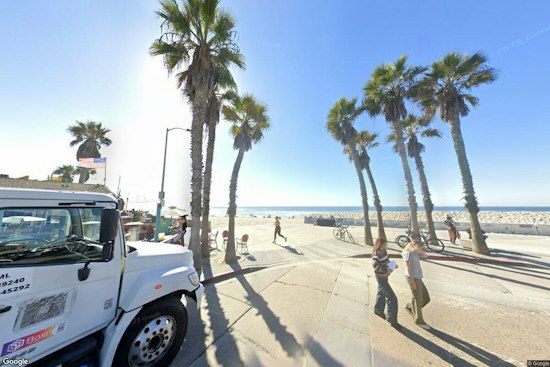 Stolen Tesla Barrels Onto Pacific Beach Boardwalk, Critically Injures Woman