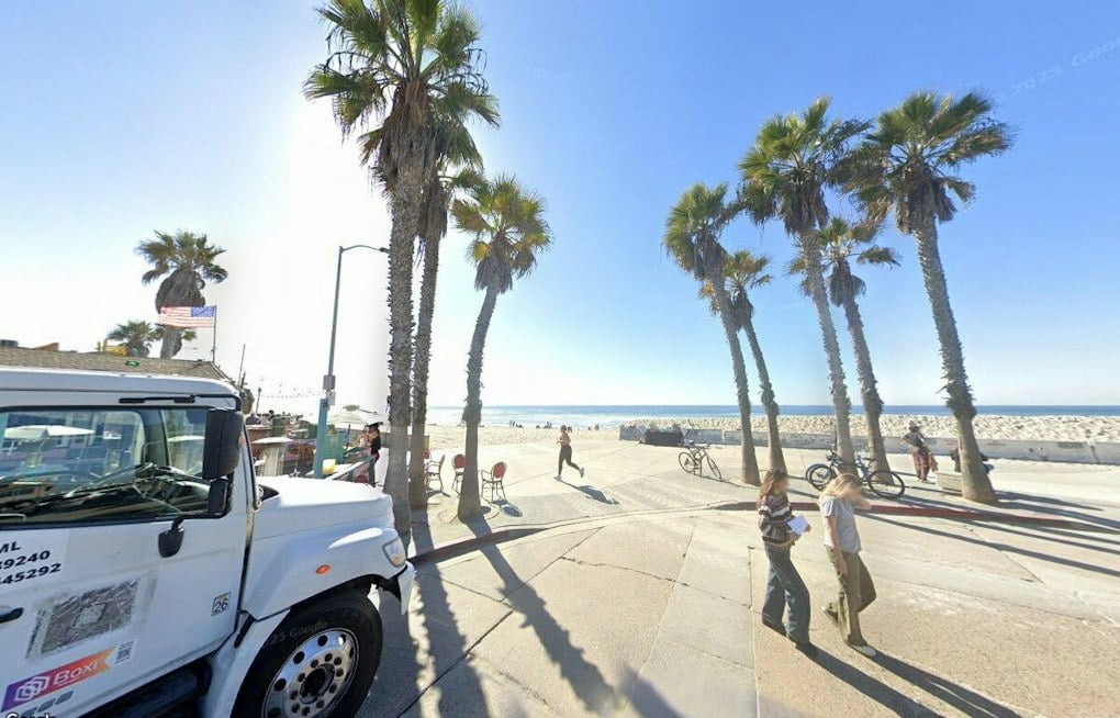 Stolen Tesla Barrels Onto Pacific Beach Boardwalk, Critically Injures Woman