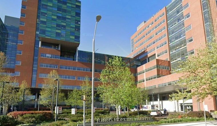 Superheroes Rappel Down Johns Hopkins Children's Center to Wash Windows for Sick Kids