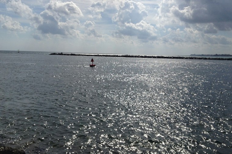 Surfer Dives Under Capsized Boat Off Palm Beach Shores, Helps Rescue Two