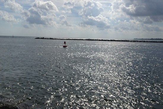 Surfer Dives Under Capsized Boat Off Palm Beach Shores, Helps Rescue Two