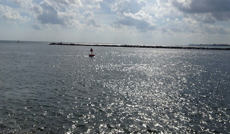 Surfer Dives Under Capsized Boat Off Palm Beach Shores, Helps Rescue Two