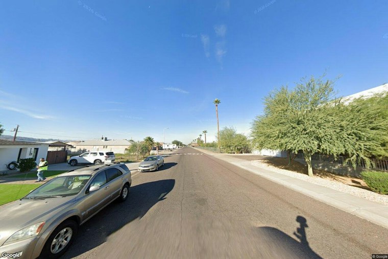 SUV Rollover Sends Vehicle Through South Phoenix Backyard Wall, Two Hospitalized