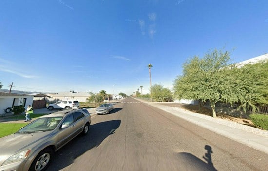 SUV Rollover Sends Vehicle Through South Phoenix Backyard Wall, Two Hospitalized