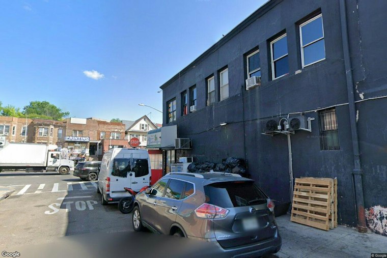 Three-Alarm Fire Rips Through Jamaica Restaurant and Pawn Shop, 140 Responders Battle Blaze
