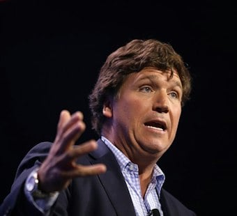 Tucker Carlson Says He'd Never Vote for Mike Rogers, Even at Gunpoint
