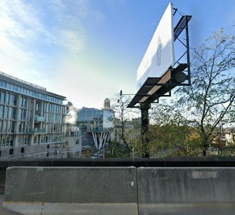 Two Men Parachute Into Pittsburgh Lot Near CMU Construction Site