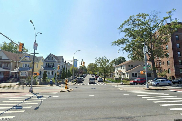 Two Men Punch, Rob Victim on Woodhaven Boulevard, Flee in Black Van