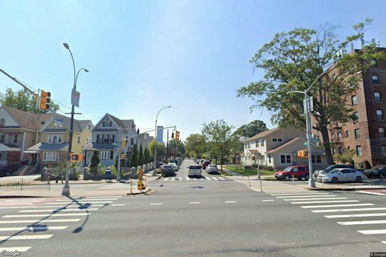 Two Men Punch, Rob Victim on Woodhaven Boulevard, Flee in Black Van