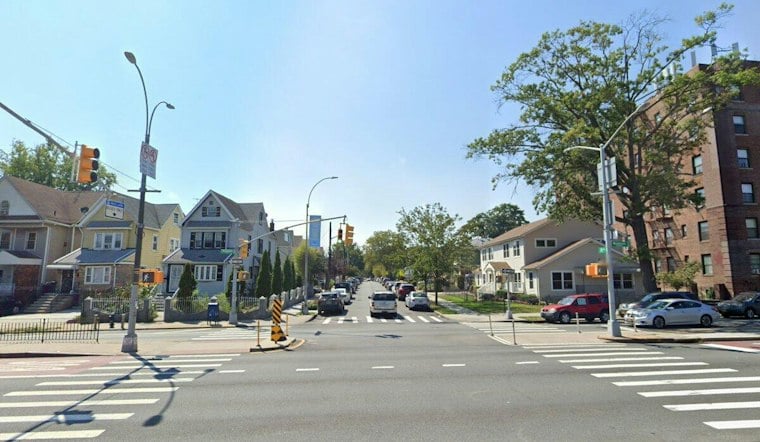 Two Men Punch, Rob Victim on Woodhaven Boulevard, Flee in Black Van