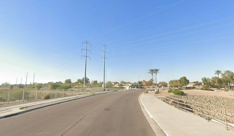 Vehicle Left Dangling Off East Phoenix Overpass After Multi-Truck Crash