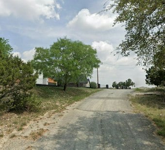 Volunteers Haul 43,000 Pounds of Trash From Bexar County's Elm Cove Pond