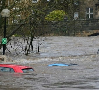Washington Declares Emergency as Flash Floods Strand Family, Swamp Houston Street