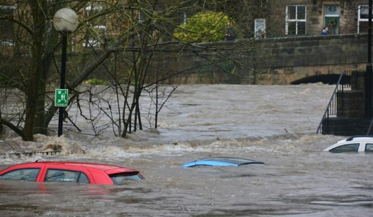 Washington Declares Emergency as Flash Floods Strand Family, Swamp Houston Street