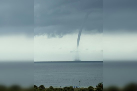 Waterspout Spotted Off Clearwater's Sand Key Park as Officer Warns Beachgoers to Steer Clear