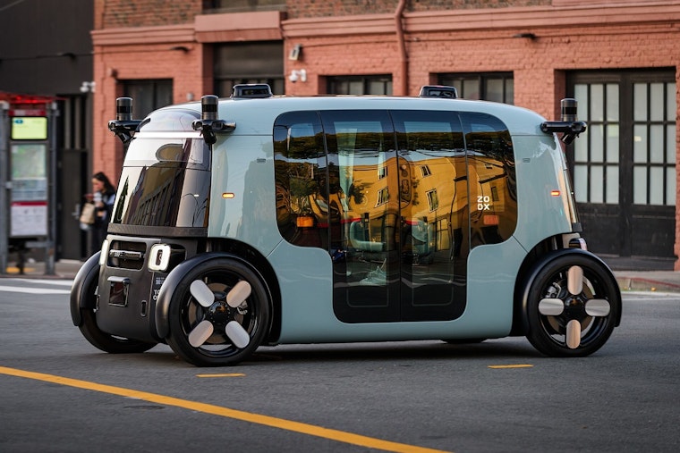 Zoox Robotaxi Cruises Past Closed Road Sign In Las Vegas Arts District, Driver Sounds Alarm