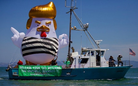 Trump chicken blimp sails to Alcatraz