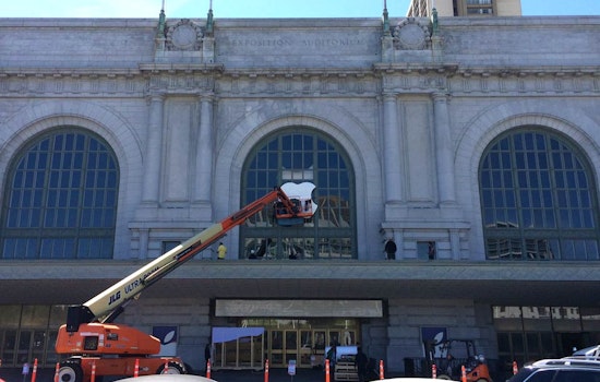 Giant Apple Logo Going Up At Bill Graham Civic Auditorium