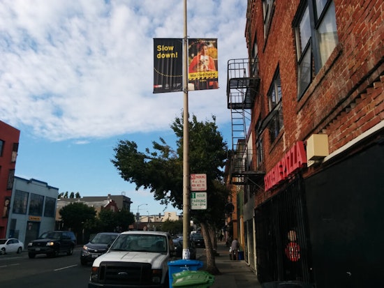 New Pedestrian Safety Banners Urge Drivers To Slow Down Along Dangerous Corridors