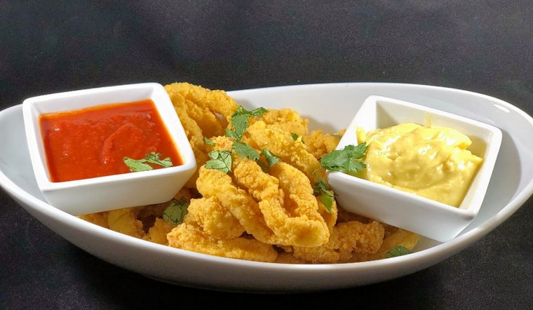 Catch seafood and cocktails at Sall Restaurant & Lounge in Hell's Kitchen
