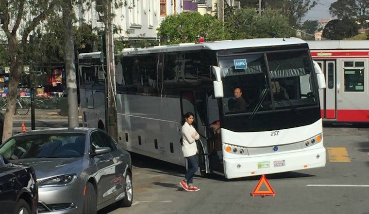 Commuter Bus Holds Up Traffic At Haight And Ashbury
