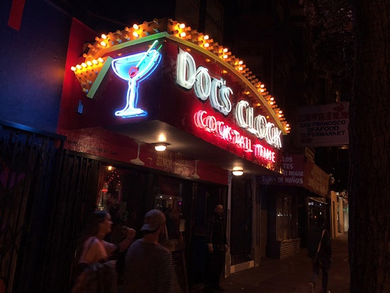 Doc's Clock reunited with neon sign at new Mission Street home