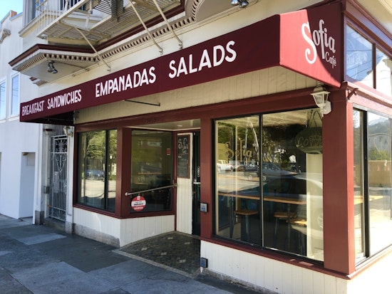 Sofia Café shutters in the Castro; chicken and rice restaurant on the way