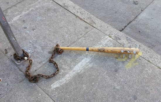Dozens Of Spiked Baseball Bats Found Chained Around The City