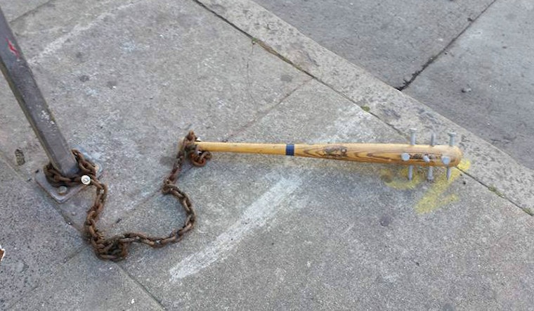 Dozens Of Spiked Baseball Bats Found Chained Around The City