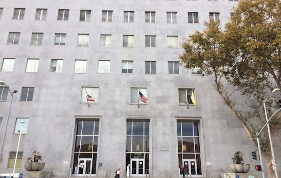 Woman arrested for lighting incendiary device at Hall of Justice