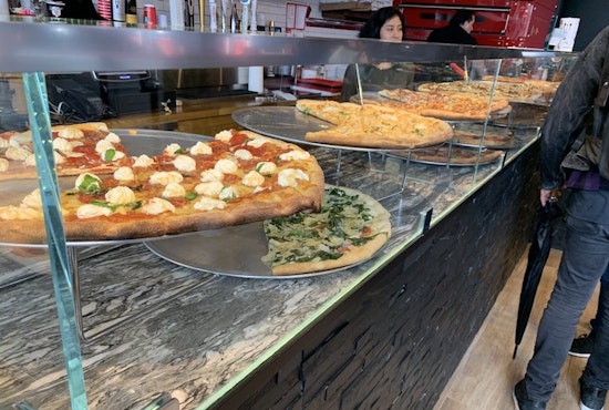 Score pizza and more at Williamsburg's new Krispy Krust Pizza