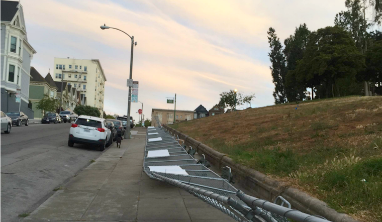 Wind Takes Out A Block Of Alamo Square's Construction Fencing