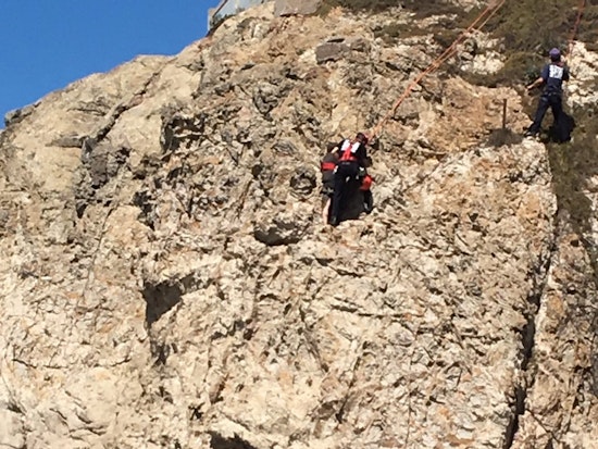 Emergency Responders Rescue Person From Cliffside Near Cliff House