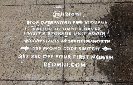 Mission Storage Facility's Sidewalk Covered In Stencils Promoting Competing Storage Startup