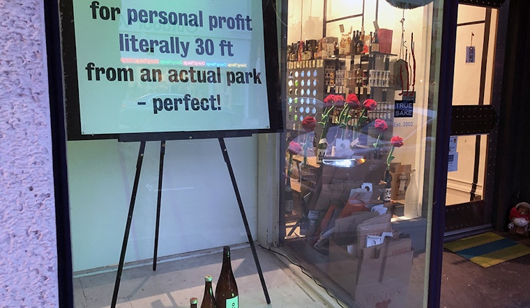 True Sake installs window sign protesting new Hayes Valley parklet