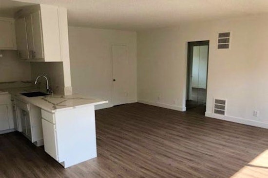 What's the cheapest rental available in Mid-Wilshire, right now?