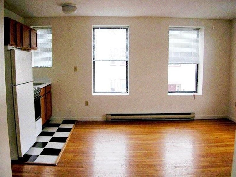 What's the cheapest rental available in Davis Square, right now?