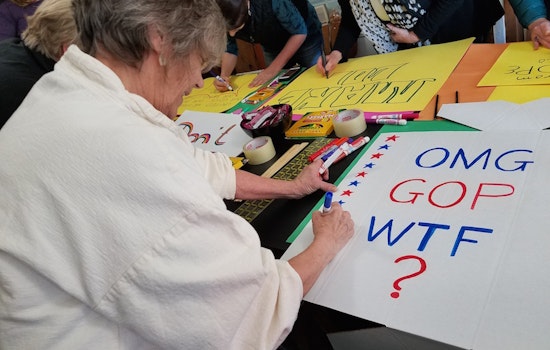 Sign-Making Workshop Brings Protesters Together Before Saturday's Big March