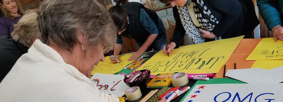 Sign-Making Workshop Brings Protesters Together Before Saturday's Big March