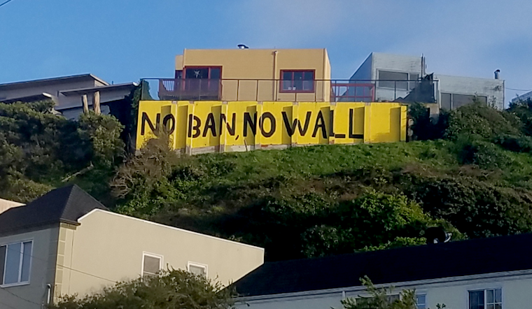 'This President Is Crazy': Sunset Resident Installs Giant 'No Ban, No Wall' Sign