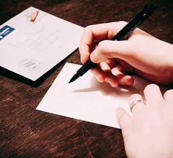 Activist Group 'Social Studies' Launches With Letter Writing Party At Divis Farmer's Market