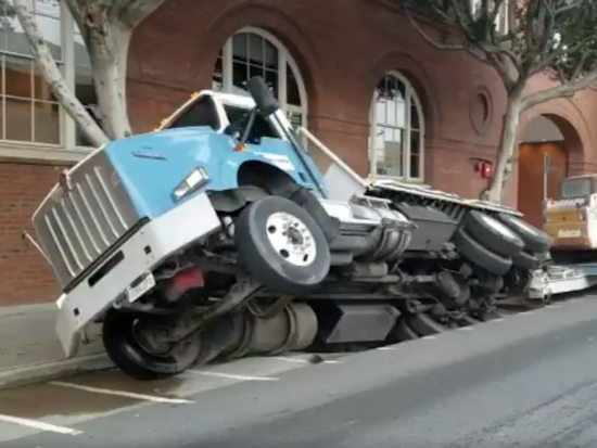 Sinkhole Opens Up Under Truck At 7th And Townsend