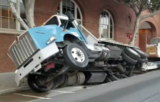 Sinkhole Opens Up Under Truck At 7th And Townsend