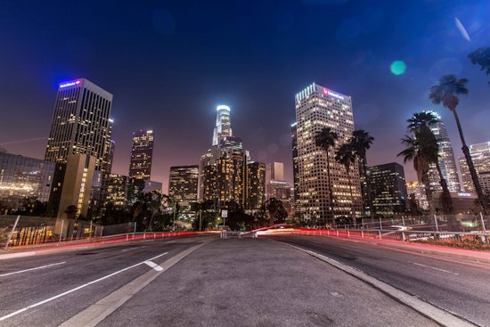 Top LA news: Man drives down street with light pole embedded in car; more